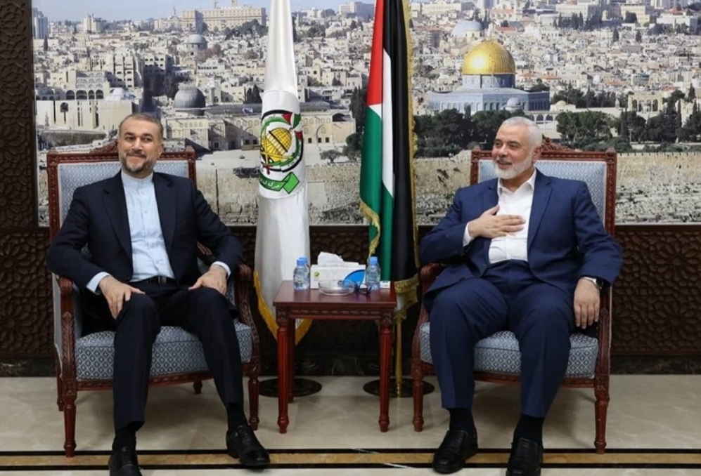 وزیر الخارجیة الإیرانی يبحث مع رئیس المکتب السیاسی لحرکة حماس اخر مستجدات العدوان الصهيوني على غزة